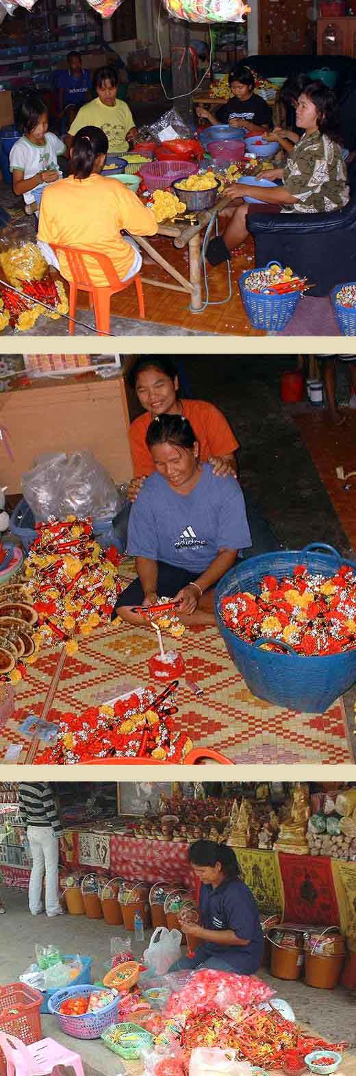 Fabrication artisanale d'amulettes thai.