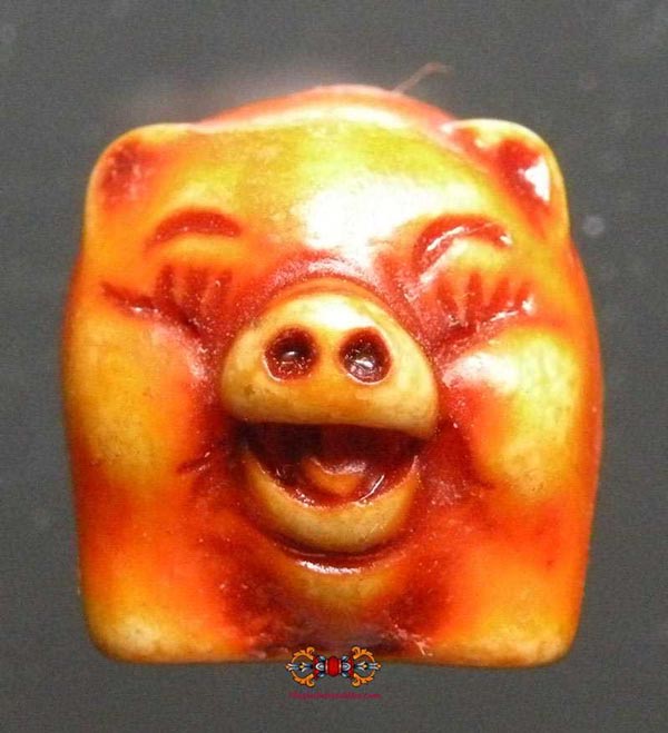 amulette cochon de luang phor lum.